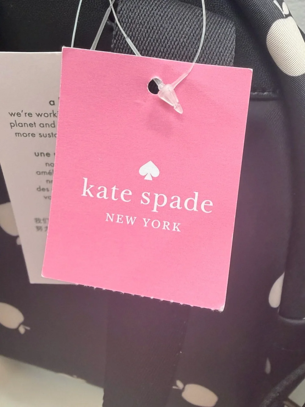 kate spade Black Mini Backpack with Pale Pink Apple Motif